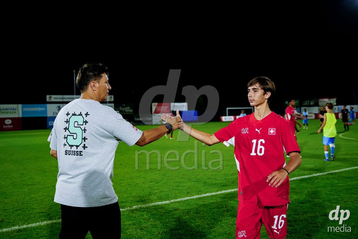 OBERE AU, Switzerland - September 8: Raul Arnold of Switzerland (R) and Gabriele Francesco, Head Coach of Switzerland, (L) after the International Friendly U20 match between Switzerland and Luxembourg at TBD on September 8, 2026 in Obere Au, Switzerland.