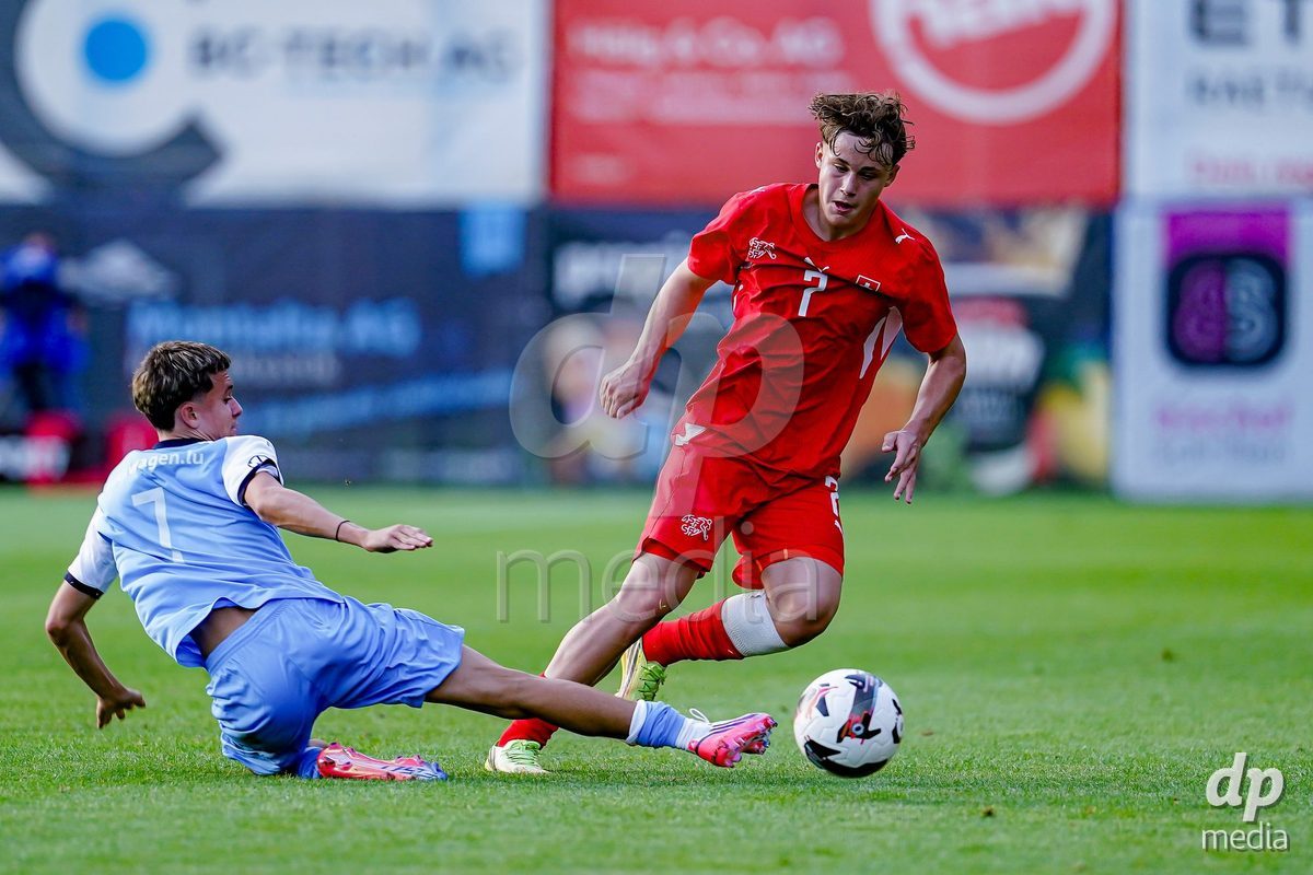OBERE AU, Switzerland - September 8: Noel Vinzenz Telser of Switzerland (R) and Luca Gonçalves Marinho (Luca Goncalves Marinho) of Luxembourg (L) battles for the ball during the International Friendly U20 match between Switzerland and Luxembourg at TBD on September 8, 2026 in Obere Au, Switzerland.