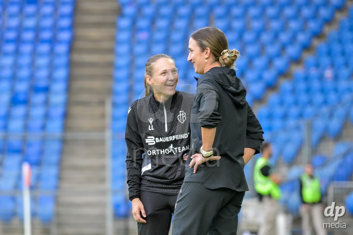 BASEL, SWITZERLAND - September 9: Laurène Leopoldes of Fc Basel and Laura Vetterlin before the AXA Women's Super League match between FC Basel 1893 and GC Frauenfussball at St. Jakob-Park on September 9, 2026 in Basel, Switzerland.