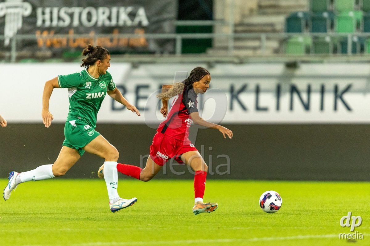 ST. GALLEN, SWITZERLAND - September 9: Joy Steck of FC Aarau Frauen (R) controls the ball under pressure from Naia Glanzmann of FC St. Gallen Frauen (L) during the AXA Women's Super League match between FC St. Gallen 1879 and FC Aarau Frauen at Berit Sitterstadion on September 9, 2026 in St. Gallen, Switzerland.
