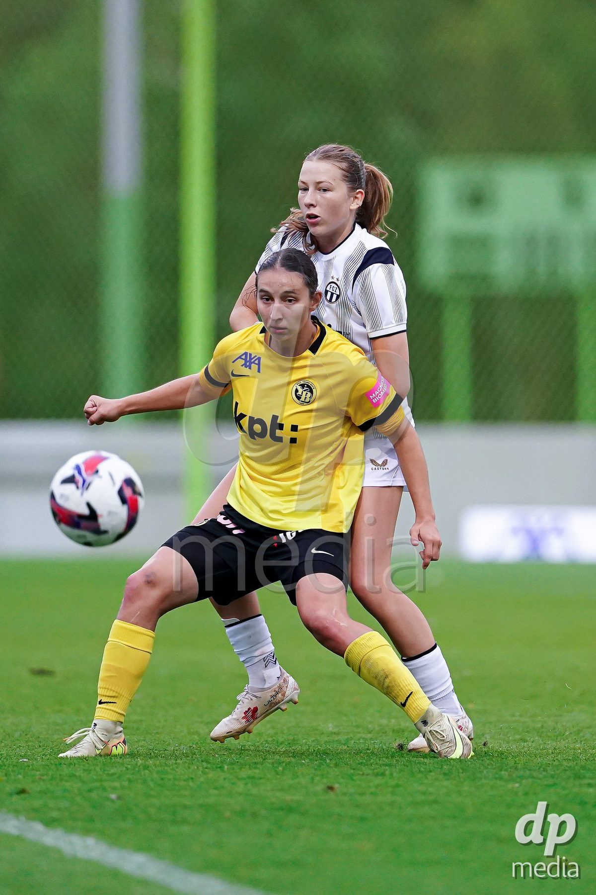 ZURICH, SWITZERLAND - September 9: Marlene Wild of FC Zurich (R) and Malaurie Granges (13 BSC YB Frauen) (L) battles for the ball during the AXA Women's Super League match between FC Zurich and BSC YB Frauen at Herrenschurli on September 9, 2026 in Zurich, Switzerland.