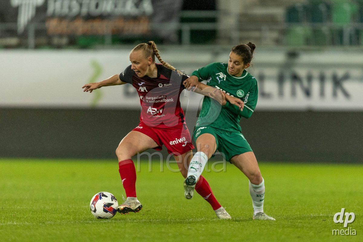 ST. GALLEN, SWITZERLAND - September 9: Michelle Stierli of FC Aarau Frauen (L) fights for the ball with Yael Aeberhard of FC St. Gallen Frauen (R) during the AXA Women's Super League match between FC St. Gallen 1879 and FC Aarau Frauen at Berit Sitterstadion on September 9, 2026 in St. Gallen, Switzerland.