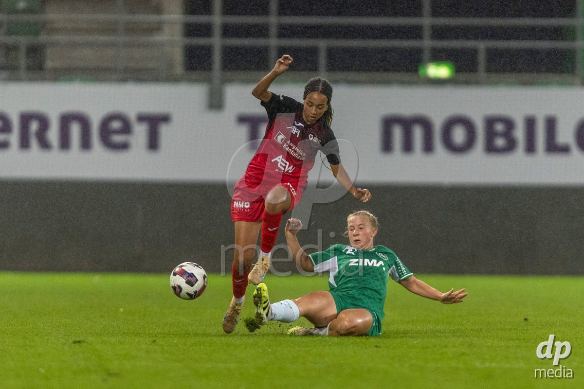 ST. GALLEN, SWITZERLAND - September 9: Joy Steck of FC Aarau Frauen (L) battles for the ball with Alzbeta Nemcova (Alžběta Němcová) of FC St. Gallen Frauen (R) during the AXA Women's Super League match between FC St. Gallen 1879 and FC Aarau Frauen at Berit Sitterstadion on September 9, 2026 in St. Gallen, Switzerland.