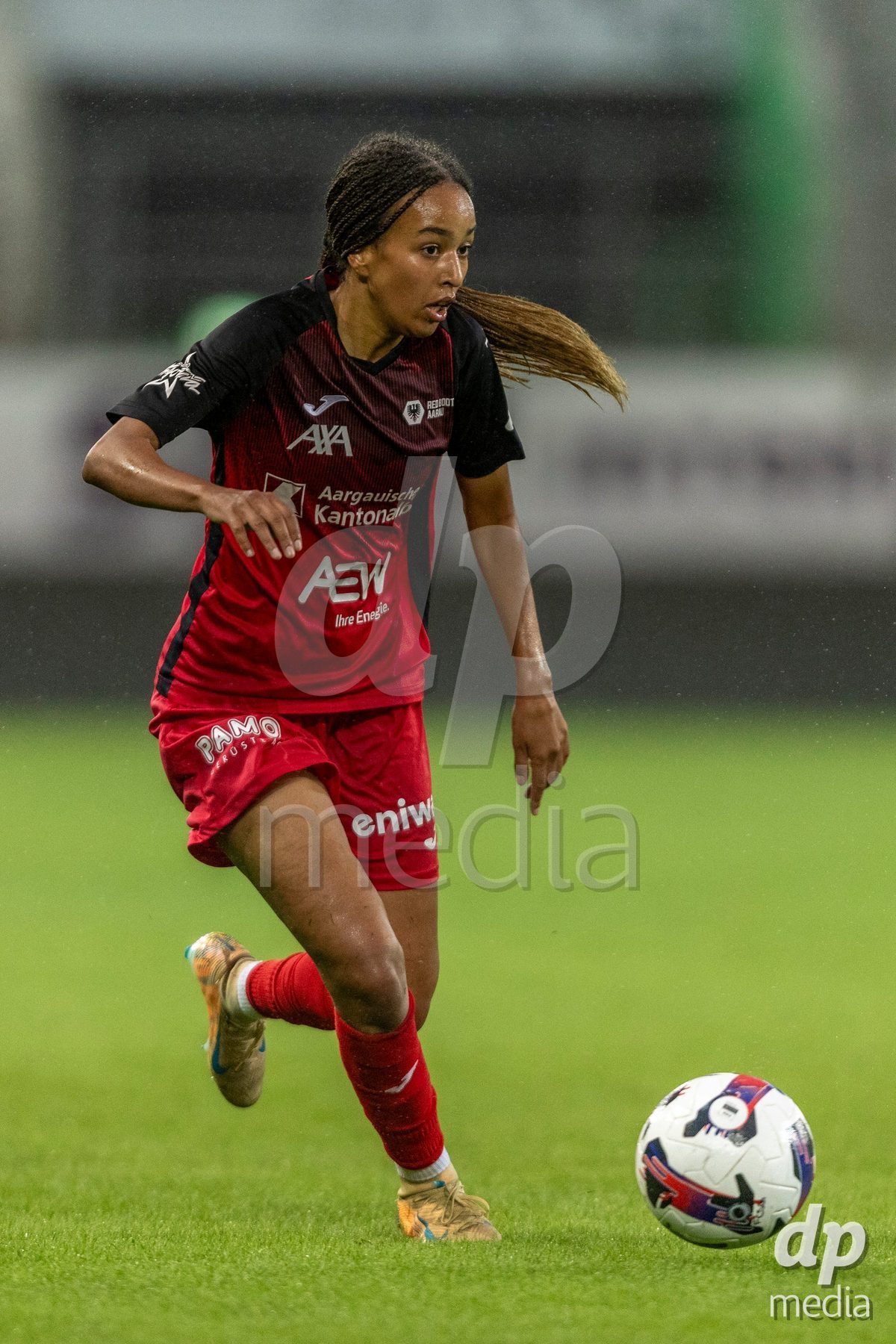 ST. GALLEN, SWITZERLAND - September 9: Joy Steck of FC Aarau Frauen controls the ball during the AXA Women's Super League match between FC St. Gallen 1879 and FC Aarau Frauen at Berit Sitterstadion on September 9, 2026 in St. Gallen, Switzerland.