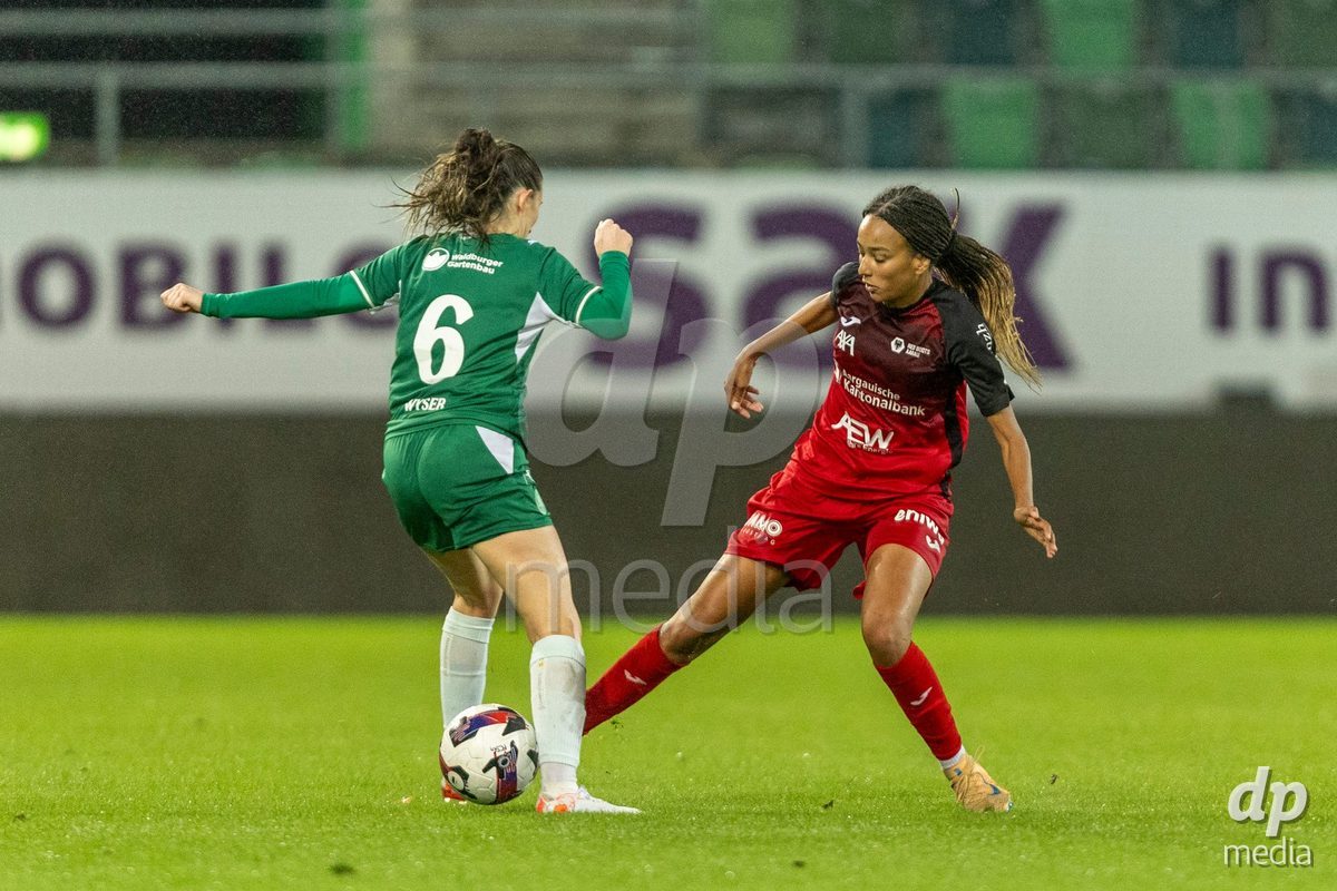 ST. GALLEN, SWITZERLAND - September 9: Joy Steck of FC Aarau Frauen (R) fights for the ball with Chantal Wyser of FC St. Gallen Frauen (L) during the AXA Women's Super League match between FC St. Gallen 1879 and FC Aarau Frauen at Berit Sitterstadion on September 9, 2026 in St. Gallen, Switzerland.