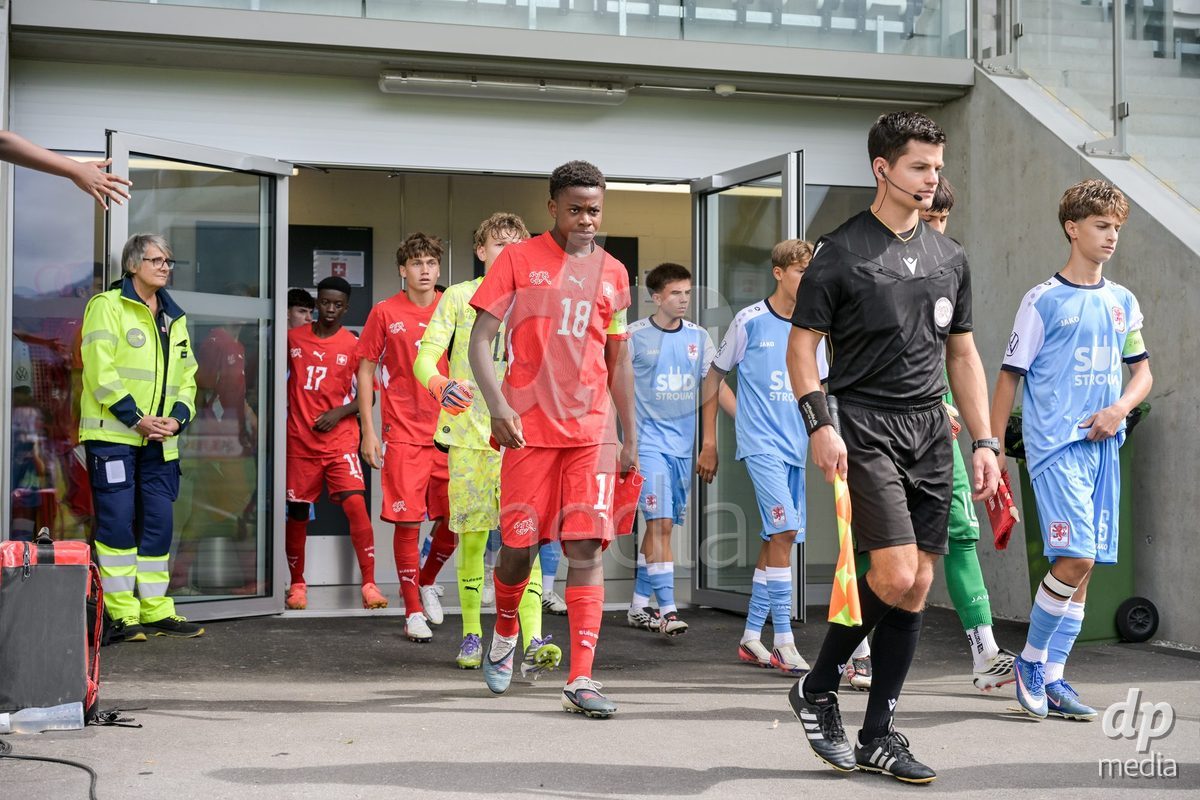 CHUR, SWITZERLAND - September 10: The players enter the field during the International friendly match between Switzerland U16 and Luxembourg U16 at Stade de Chur on September 10,2026 in Chur, Switzerland