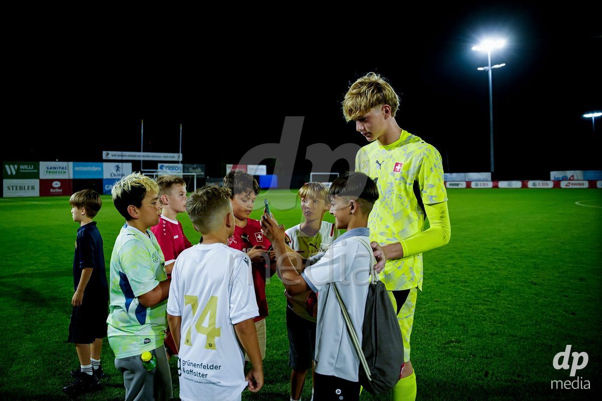 OBERE AU, Switzerland - September 8: Valentin Büel (Valentin Buel) of Switzerland with fans after the International Friendly U20 match between Switzerland and Luxembourg at TBD on September 8, 2026 in Obere Au, Switzerland.