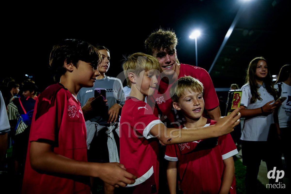 OBERE AU, Switzerland - September 8: Lars Ackermann of Switzerland with fans after the International Friendly U20 match between Switzerland and Luxembourg at TBD on September 8, 2026 in Obere Au, Switzerland.
