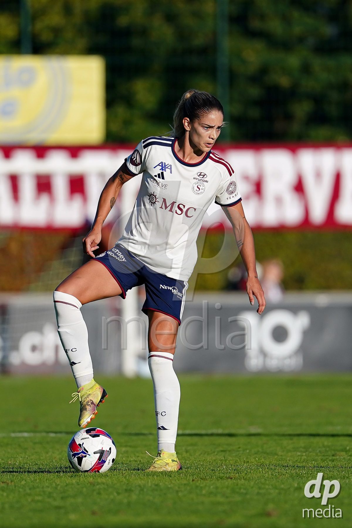 Rapperswil, Switzerland - September 12: Stefanie Da Eira (Stéfanie Da Eira) of Servette FC Chenois Feminin controls the ball during the AXA Women's Super League match between FC Rapperswil-Jona and Servette FC Chenois Feminin at Stadion Grünfeld on September 12, 2026 in Rapperswil, Switzerland.