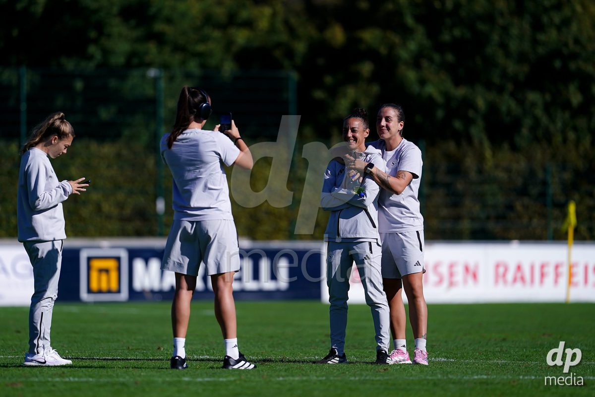 Rapperswil, Switzerland - September 12: Gloria Marinelli of Servette FC Chenois Feminin (R) and Paula Serrano of Servette FC Chenois Feminin (L) arrival during the AXA Women's Super League match between FC Rapperswil-Jona and Servette FC Chenois Feminin at Stadion Grünfeld on September 12, 2026 in Rapperswil, Switzerland.