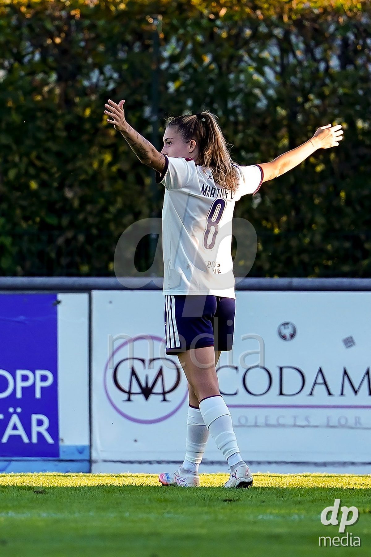 Rapperswil, Switzerland - September 12: Asun Martinez (Asun Martínez) of Servette FC Chenois Feminin celebrating after scoring teams first goal during the AXA Women's Super League match between FC Rapperswil-Jona and Servette FC Chenois Feminin at Stadion Grünfeld on September 12, 2026 in Rapperswil, Switzerland.