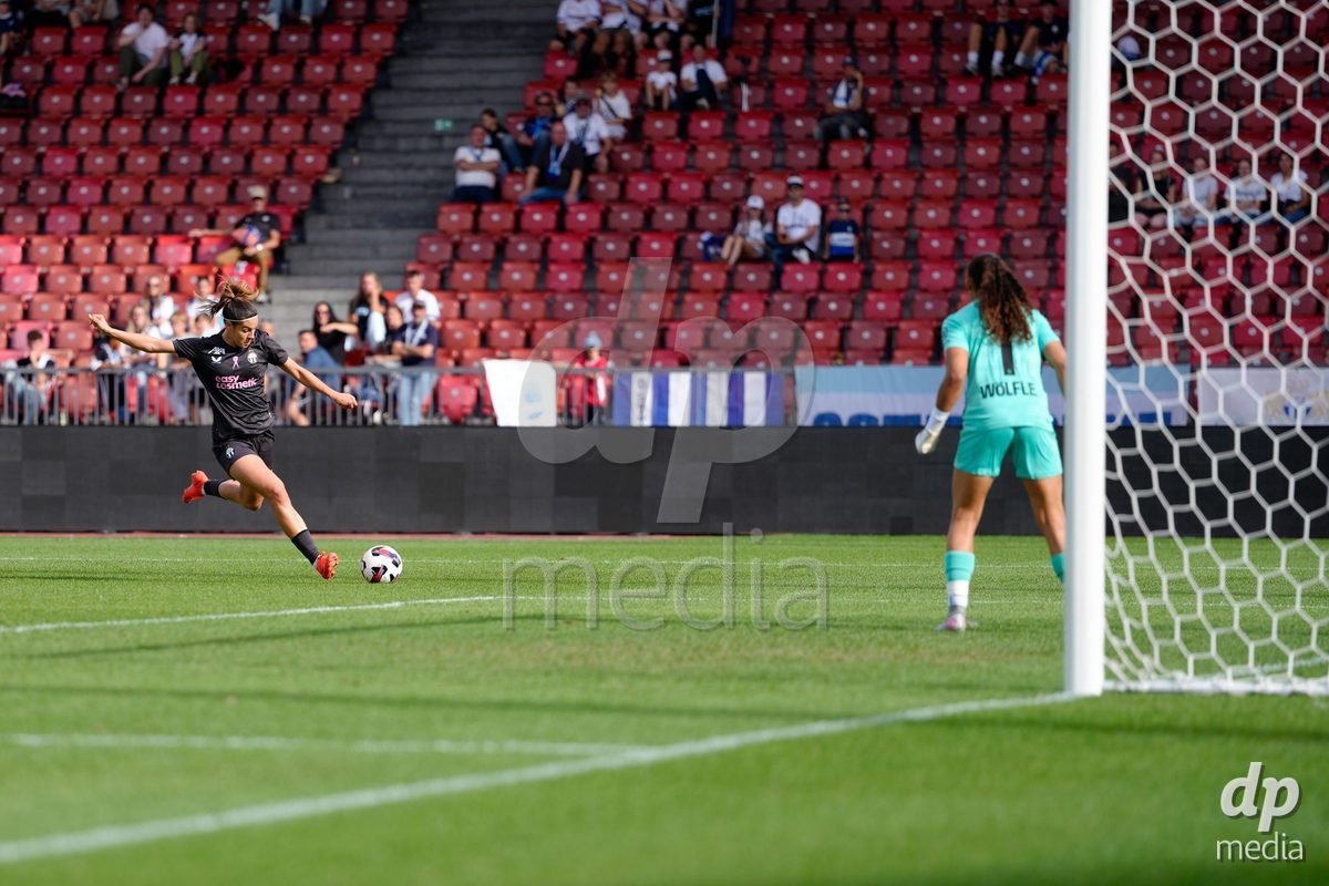 Zurich, Switzerland - September 13: Nina Kajzba of FC Zürich in action against Goalkeeper Selina Wolfle of FC Basel 1893 during the AXA Women's Super League match between FC Zurich and FC Basel 1893 at Stadion Letzigrund on September 13, 2026 in Zurich, Switzerland.