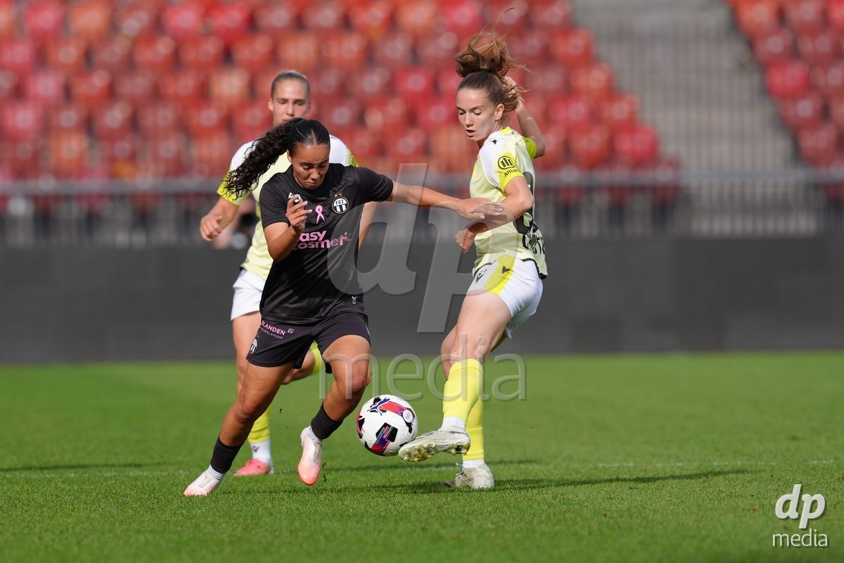 Zurich, Switzerland - September 13: Carla Christen and Emilia Soiron of FC Basel 1893 against Nevia Stoob of FC Zürich during the AXA Women's Super League match between FC Zurich and FC Basel 1893 at Stadion Letzigrund on September 13, 2026 in Zurich, Switzerland.