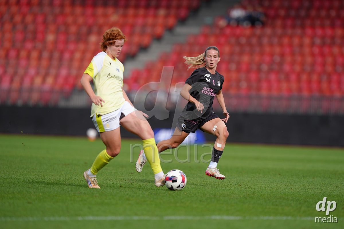 Zurich, Switzerland - September 13: Lena Maria Goppel of FC Basel 1893 against Kim Dubs of FC Zürich during the AXA Women's Super League match between FC Zurich and FC Basel 1893 at Stadion Letzigrund on September 13, 2026 in Zurich, Switzerland.