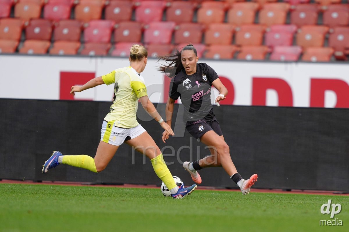 Zurich, Switzerland - September 13: Janina Egli of FC Zürich against Fabia Reinschmidt of FC Basel 1893 during the AXA Women's Super League match between FC Zurich and FC Basel 1893 at Stadion Letzigrund on September 13, 2026 in Zurich, Switzerland.