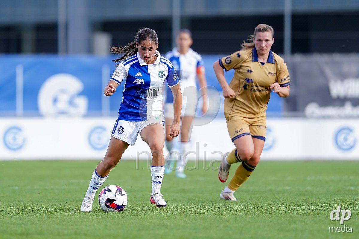 NIEDERHASLI, SWITZERLAND - September 13: Ilaria Maddaloni of GC Frauenfussball (L) battle for the ball during the AXA Women's Super League match between GC Frauenfussball and FC Luzern at GC Campus on September 13, 2026 in Niederhasli, Switzerland.