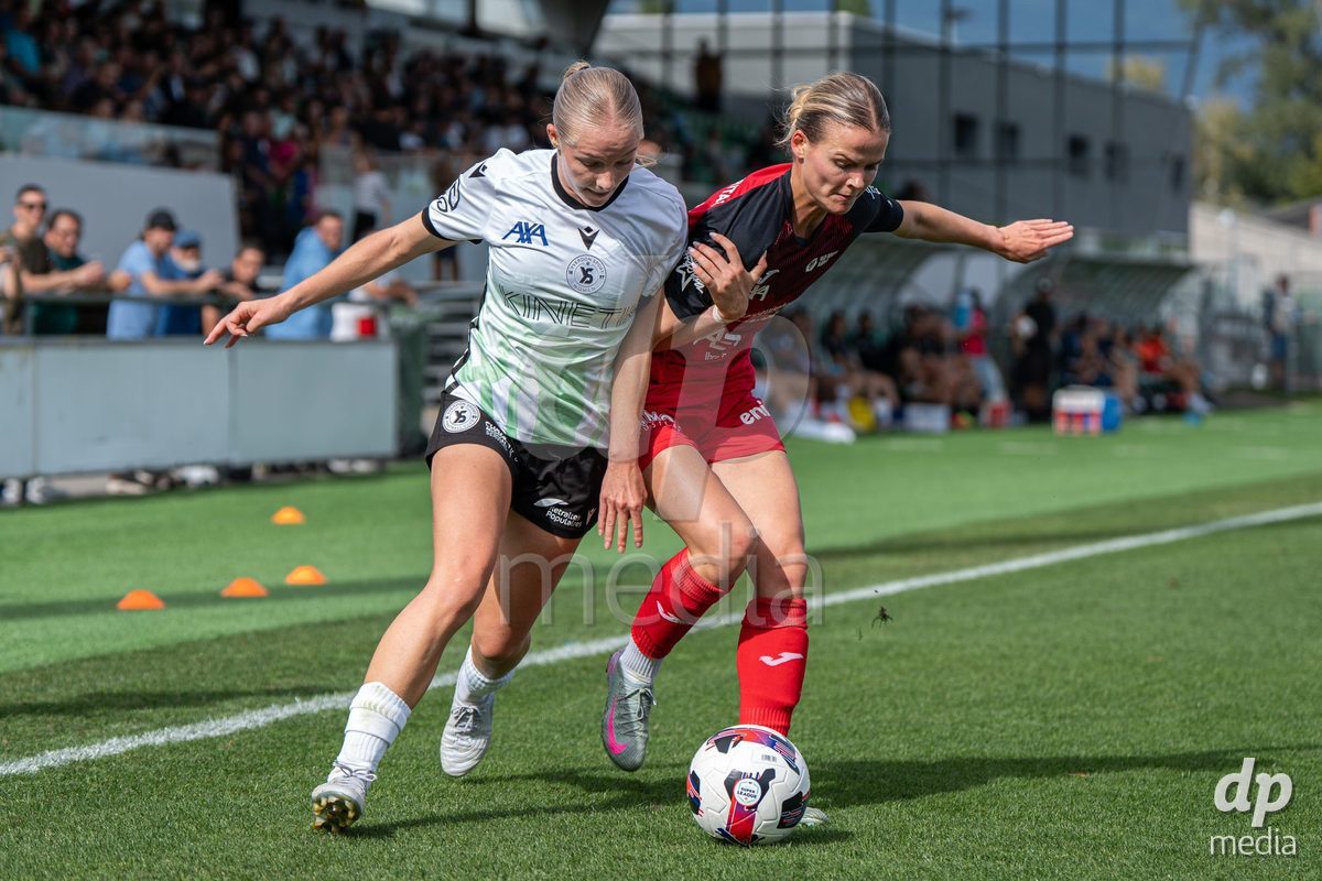 YVERDON-LES-BAINS - SWITZERLAND - SEPTEMBER 13 : Duel between Xenia Truninger of FC Aarau Frauen and Léane Fontaine of Yverdon Sport Women during the AXA Women's Super League match between Yverdon Sport Women and FC Aarau Frauen at Stade Municipal on September 13, 2026 in Yverdon-les-Bains, Switzerland.