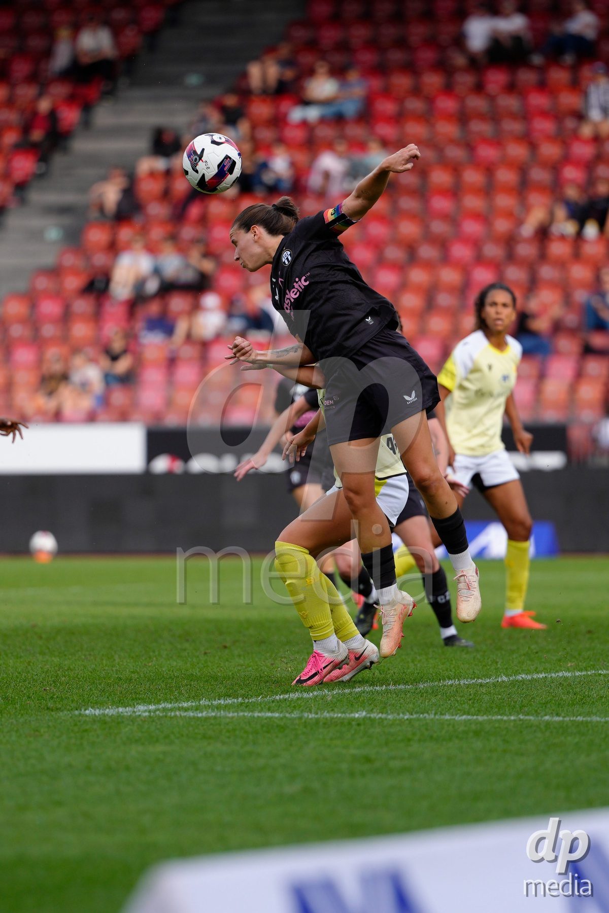 Zurich, Switzerland - September 13: Naomi Megroz of FC Zürich with a header during the AXA Women's Super League match between FC Zurich and FC Basel 1893 at Stadion Letzigrund on September 13, 2026 in Zurich, Switzerland.
