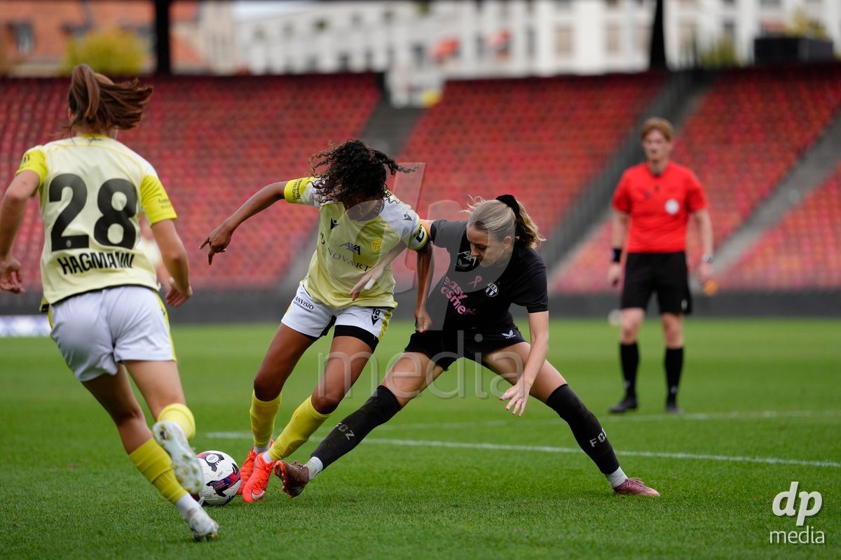 Zurich, Switzerland - September 13: Coumba Louisa Sow of FC Basel 1893 against Briana Eads of FC Zürich during the AXA Women's Super League match between FC Zurich and FC Basel 1893 at Stadion Letzigrund on September 13, 2026 in Zurich, Switzerland.