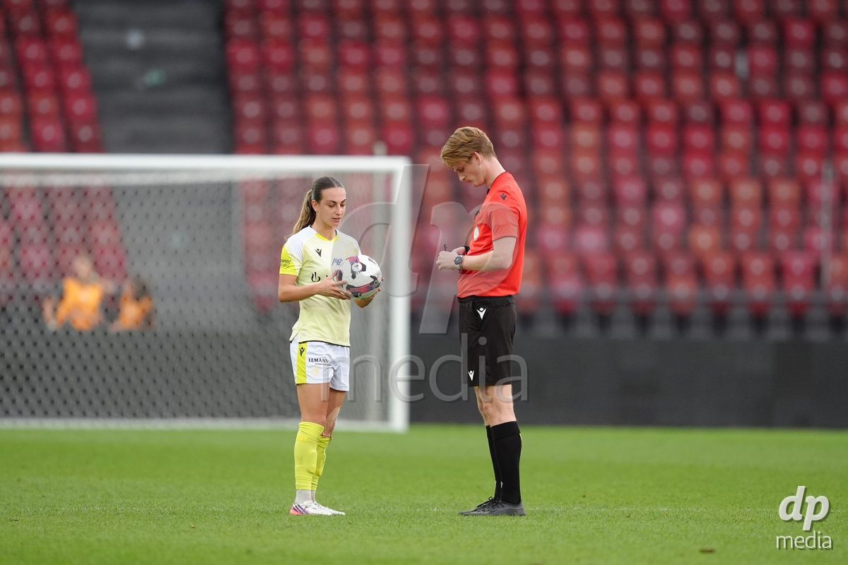Zurich, Switzerland - September 13: Referee Samuel Gubic with Alice Ilaria Berti of FC Basel 1893 during the AXA Women's Super League match between FC Zurich and FC Basel 1893 at Stadion Letzigrund on September 13, 2026 in Zurich, Switzerland.