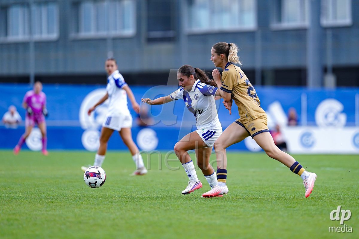NIEDERHASLI, SWITZERLAND - September 13: Elena Schallberger of FC Luzern (R) and Ilaria Maddaloni of GC Frauenfussball (L) battle for the ball during the AXA Women's Super League match between GC Frauenfussball and FC Luzern at GC Campus on September 13, 2026 in Niederhasli, Switzerland.