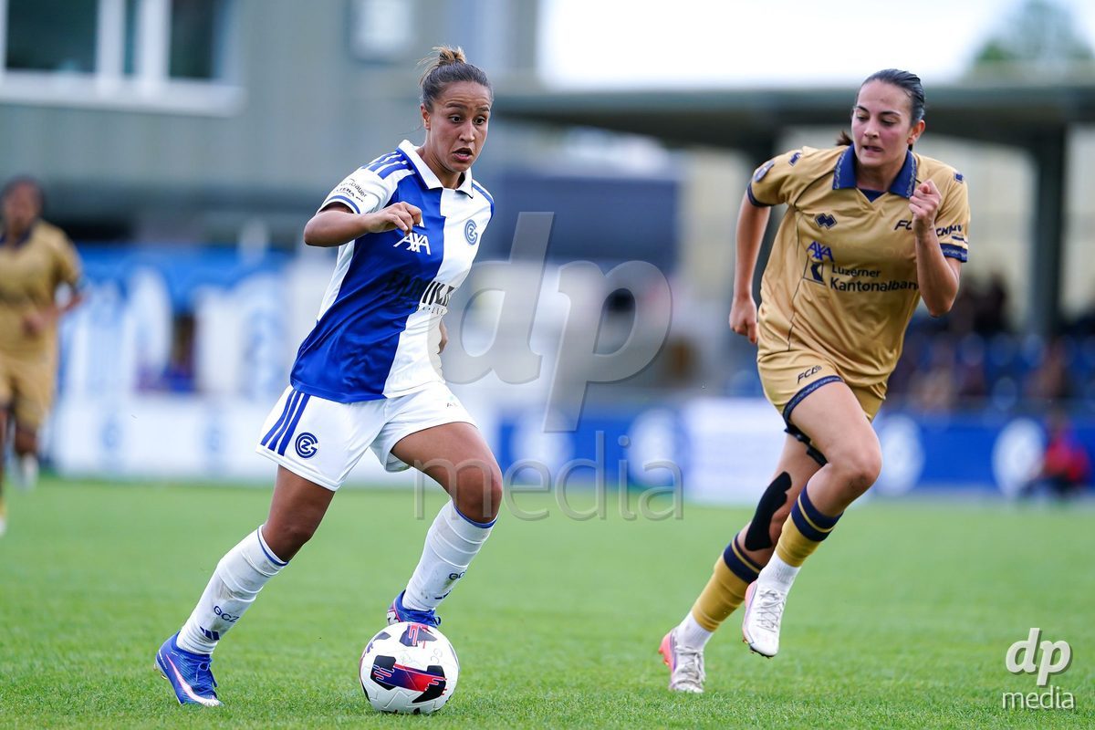 NIEDERHASLI, SWITZERLAND - September 13: Dalila Belen Ippolito of GC Frauenfussball (L) battles for the ball during the AXA Women's Super League match between GC Frauenfussball and FC Luzern at GC Campus on September 13, 2026 in Niederhasli, Switzerland.
