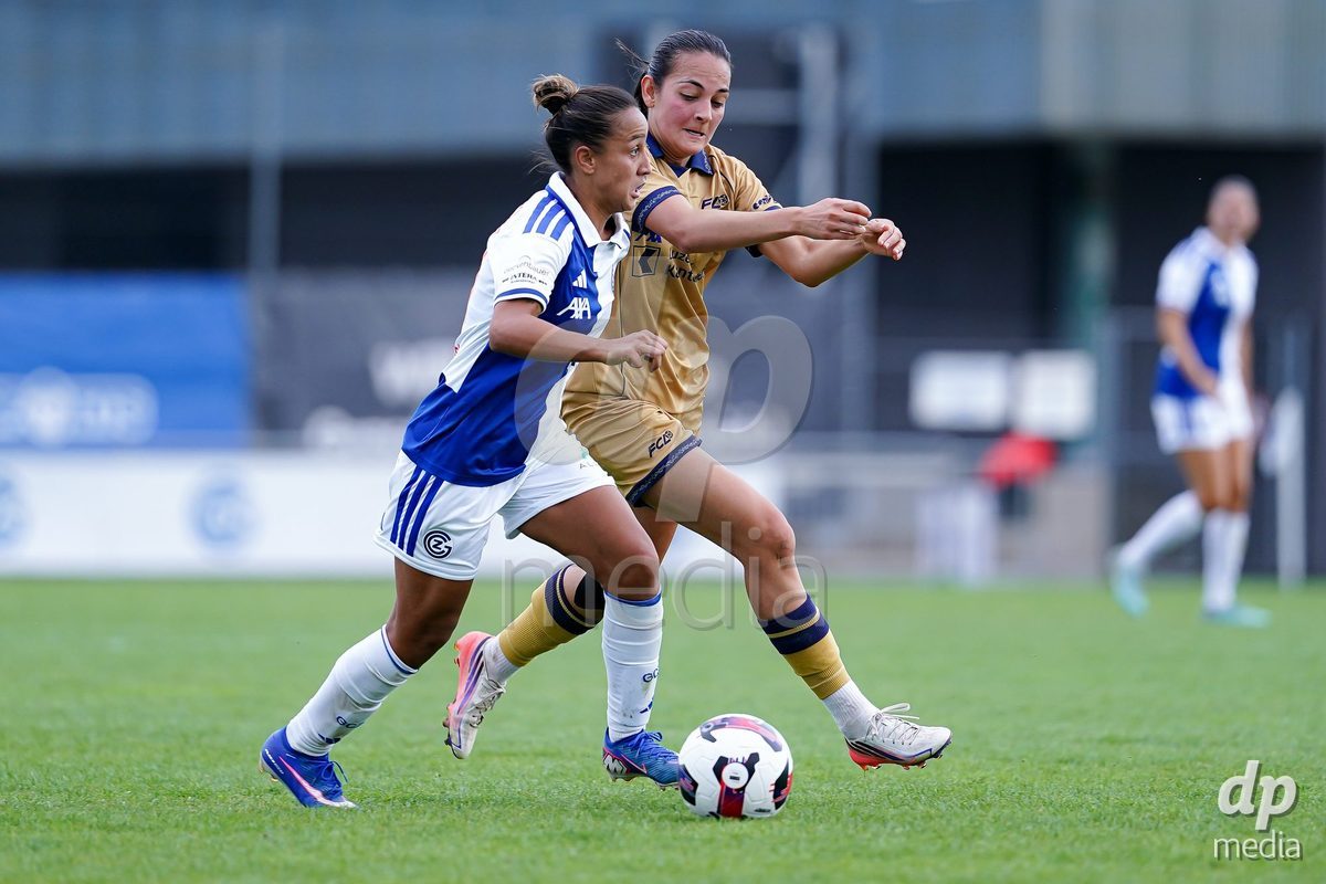 NIEDERHASLI, SWITZERLAND - September 13: Athanasia Moraitou of FC Luzern (R) and Dalila Belen Ippolito of GC Frauenfussball (L) battle for the ball during the AXA Women's Super League match between GC Frauenfussball and FC Luzern at GC Campus on September 13, 2026 in Niederhasli, Switzerland.