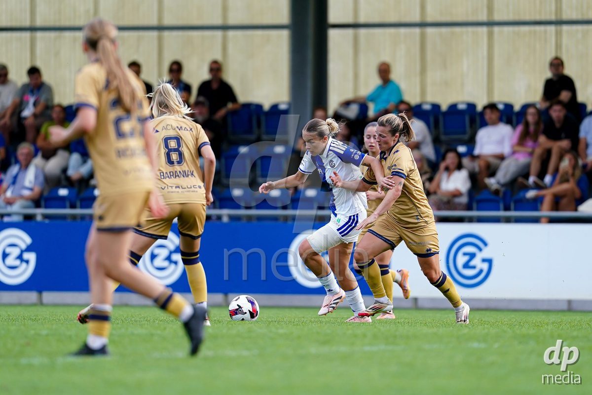 NIEDERHASLI, SWITZERLAND - September 13: Katja Nicola Orschmann FC Luzern (R) and Ella Ljustina of GC Frauenfussball (L) battle for the ball during the AXA Women's Super League match between GC Frauenfussball and FC Luzern at GC Campus on September 13, 2026 in Niederhasli, Switzerland.