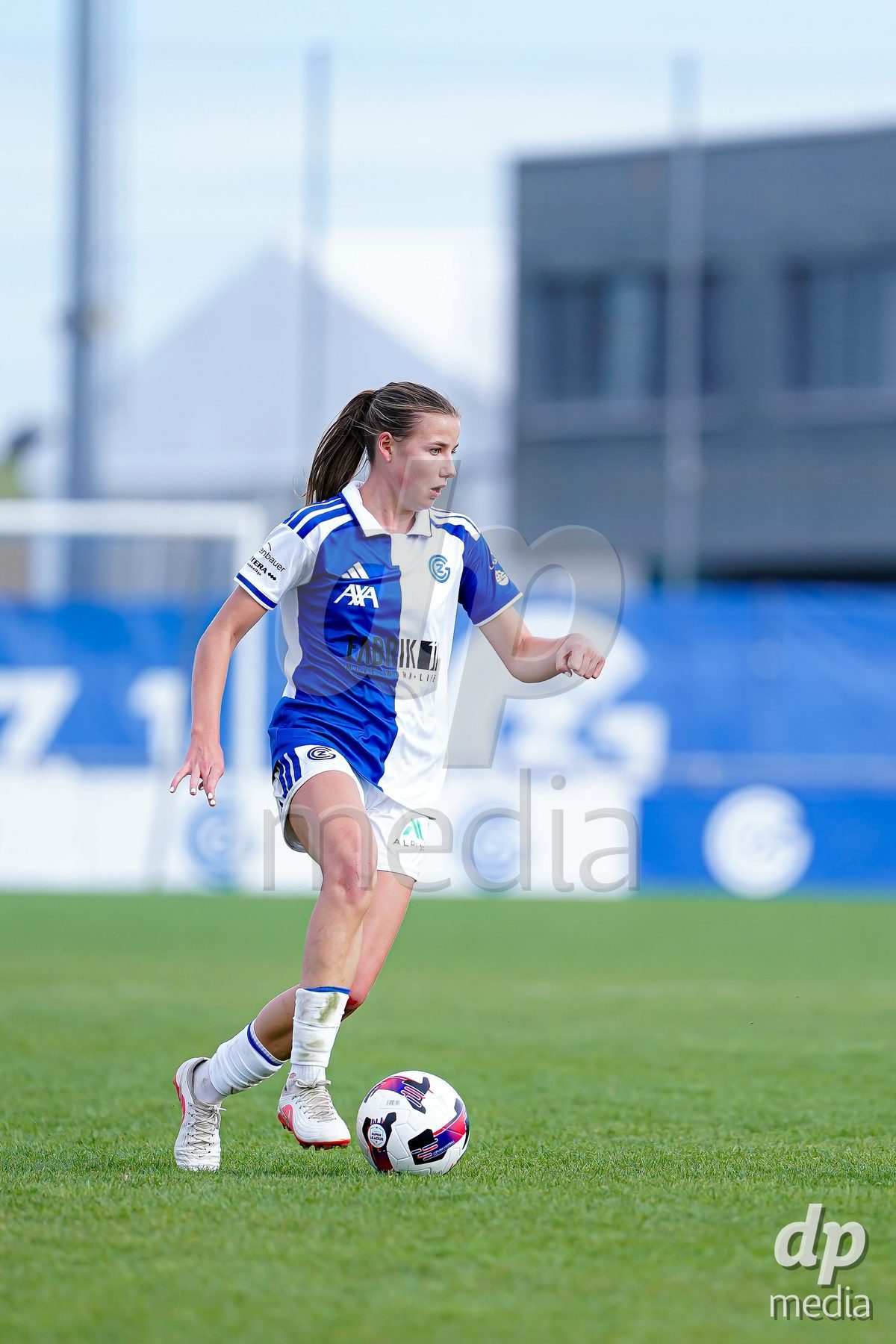 NIEDERHASLI, SWITZERLAND - September 13: Giulia Looser of GC Frauenfussball controls the ball during the AXA Women's Super League match between GC Frauenfussball and FC Luzern at GC Campus on September 13, 2026 in Niederhasli, Switzerland.