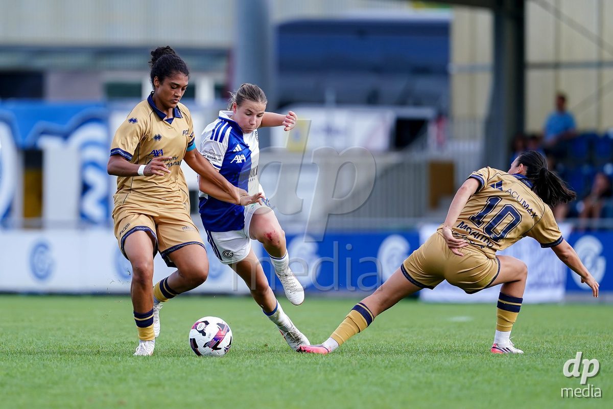 NIEDERHASLI, SWITZERLAND - September 13: Giulia Looser of GC Frauenfussball (R) and Aldiana Amuchie of FC Luzern (L) battle for the ball during the AXA Women's Super League match between GC Frauenfussball and FC Luzern at GC Campus on September 13, 2026 in Niederhasli, Switzerland.