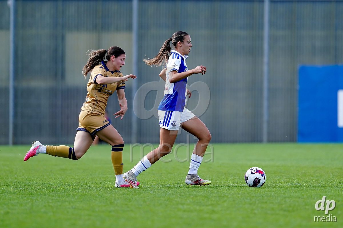 NIEDERHASLI, SWITZERLAND - September 13: Emma Egli of GC Frauenfussball (R) and Ramona Schallberger of FC Luzern (L) battle for the ball during the AXA Women's Super League match between GC Frauenfussball and FC Luzern at GC Campus on September 13, 2026 in Niederhasli, Switzerland.
