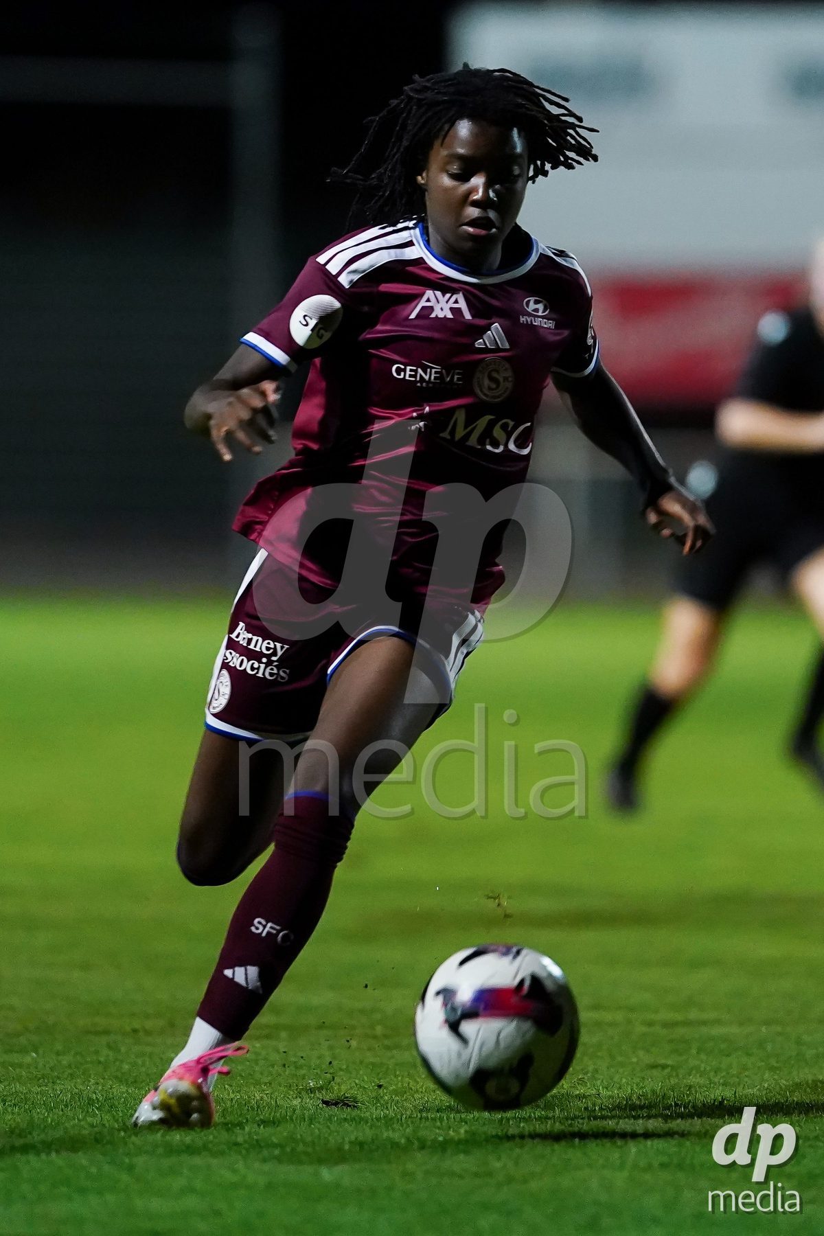 GENEVA, SWITZERLAND - SEPTEMBER 18: Garance Nein of Servette FC Chenois Feminin controls the ball during the AXA Women's Super League match between Servette FC Chenois Feminin and FC Zurich at Stade de Trois-Chene on September 18, 2026 in Geneva, Switzerland.