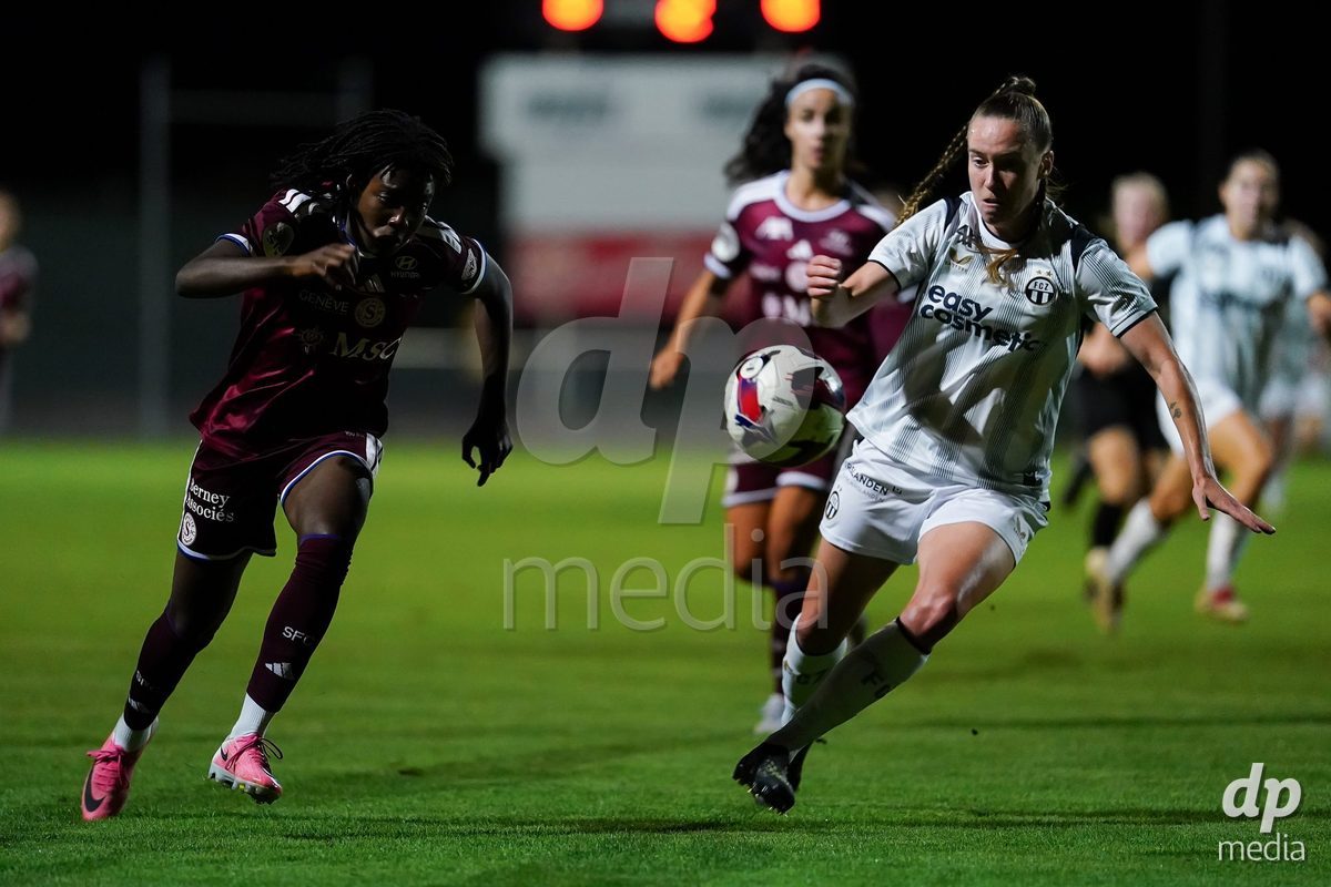 GENEVA, SWITZERLAND - SEPTEMBER 18: Claire O'Riordan of FC Zurich (R) and Garance Nein of Servette FC Chenois Feminin  (L) battle for the ball during the AXA Women's Super League match between Servette FC Chenois Feminin and FC Zurich at Stade de Trois-Chene on September 18, 2026 in Geneva, Switzerland.