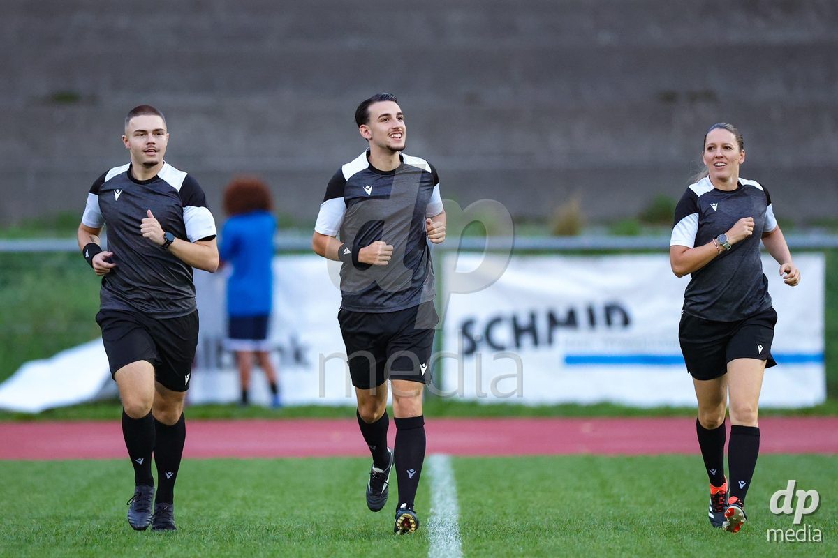 LUZERN, SWITZERLAND - SEPTEMBER 18: Alessio Feola (Schiedsrichter, m), Belinda Pierre-Brem (Schiedsrichter-Assistentin, r.) and Leonardo Patkovic (Schiedsrichter-Assisten) during the AXA Women's Super League match between FC Luzern and FC Yverdon Women at Hubelmatt on September 18, 2026 in Luzern, Switzerland.