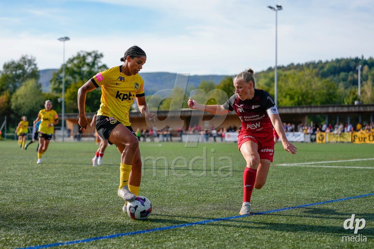 AARAU, SWITZERLAND - SEPTEMBER 19: Michelle Stierli of FC Aarau Frauen against Josephine Afua Kyerewaa Bonsu of BSC YB Frauen during the AXA Women's Super League match between FC Aarau Frauen and BSC YB Frauen at Sportanlage Schachen on September 19, 2026 in Aarau, Switzerland.