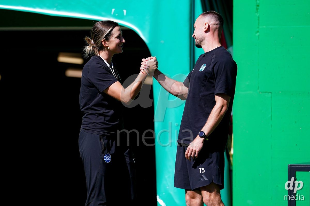 ST. GALLEN, SWITZERLAND - SEPTEMBER 19: Laura Vetterlein, Head Coach of GC Frauenfussball, (L) and GC Frauenfussball staff during the AXA Women's Super League match between FC St. Gallen 1879 and GC Frauenfussball at Berit Sitterstadion on September 19, 2026 in St. Gallen, Switzerland.