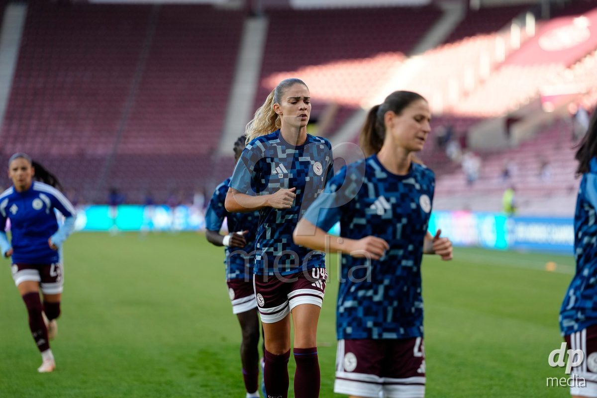 GENEVA, SWITZERLAND - SEPTEMBER 23: Noemie Carage and Stefanie Da Eira of Servette FC Chenois Feminin during warmup before the UEFA Women's Champions League match between Servette FC Chenois Feminin and OL Lyonnes at Stade de Geneve on September 23, 2026 in Geneva, Switzerland.