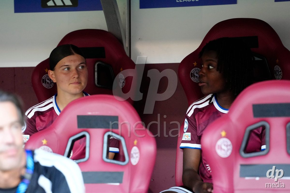 GENEVA, SWITZERLAND - SEPTEMBER 23: Chiara Wallin together with Garance Nein of Servette FC Chenois Feminin on the bench before the UEFA Women's Champions League match between Servette FC Chenois Feminin and OL Lyonnes at Stade de Geneve on September 23, 2026 in Geneva, Switzerland.