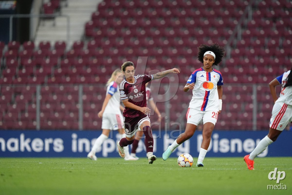 GENEVA, SWITZERLAND - SEPTEMBER 23: Lily Yohannes of Olympique Lyon against Natasa Andonova of Servette FC Chenois Feminin during the UEFA Women's Champions League match between Servette FC Chenois Feminin and OL Lyonnes at Stade de Geneve on September 23, 2026 in Geneva, Switzerland.
