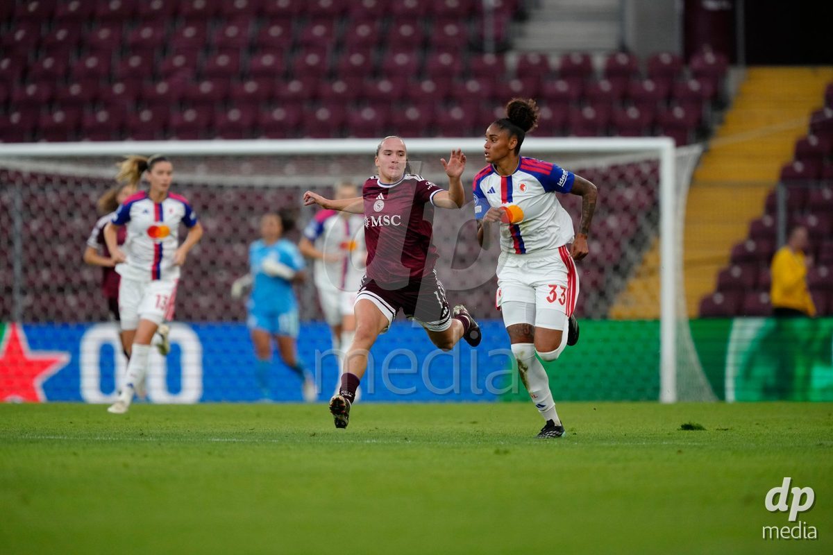 GENEVA, SWITZERLAND - SEPTEMBER 23: Magdalena Sobal of Servette FC Chenois Feminin against Tarciane dos Santos de Lima of Olympique Lyon during the UEFA Women's Champions League match between Servette FC Chenois Feminin and OL Lyonnes at Stade de Geneve on September 23, 2026 in Geneva, Switzerland.
