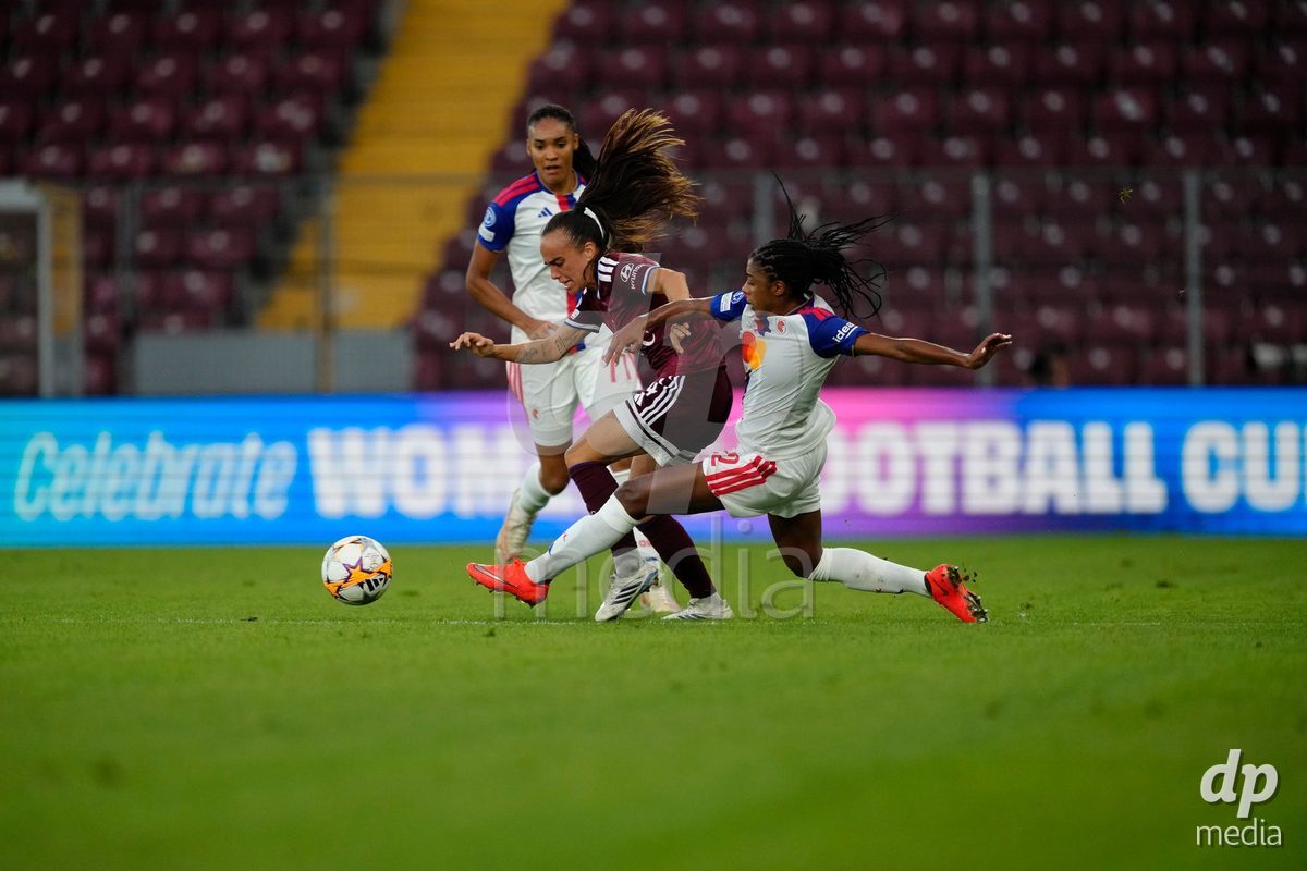 GENEVA, SWITZERLAND - SEPTEMBER 23: Salma Paralluelo and Ashley Lawrence of Olympique Lyon against Joana Marchao of Servette FC Chenois Feminin during the UEFA Women's Champions League match between Servette FC Chenois Feminin and OL Lyonnes at Stade de Geneve on September 23, 2026 in Geneva, Switzerland.