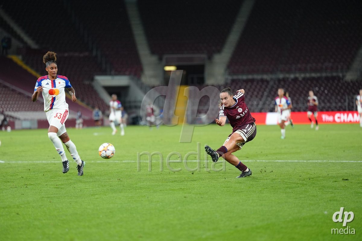 GENEVA, SWITZERLAND - SEPTEMBER 23: Magdalena Sobal of Servette FC Chenois Feminin against Tarciane dos Santos de Lima of Olympique Lyon during the UEFA Women's Champions League match between Servette FC Chenois Feminin and OL Lyonnes at Stade de Geneve on September 23, 2026 in Geneva, Switzerland.