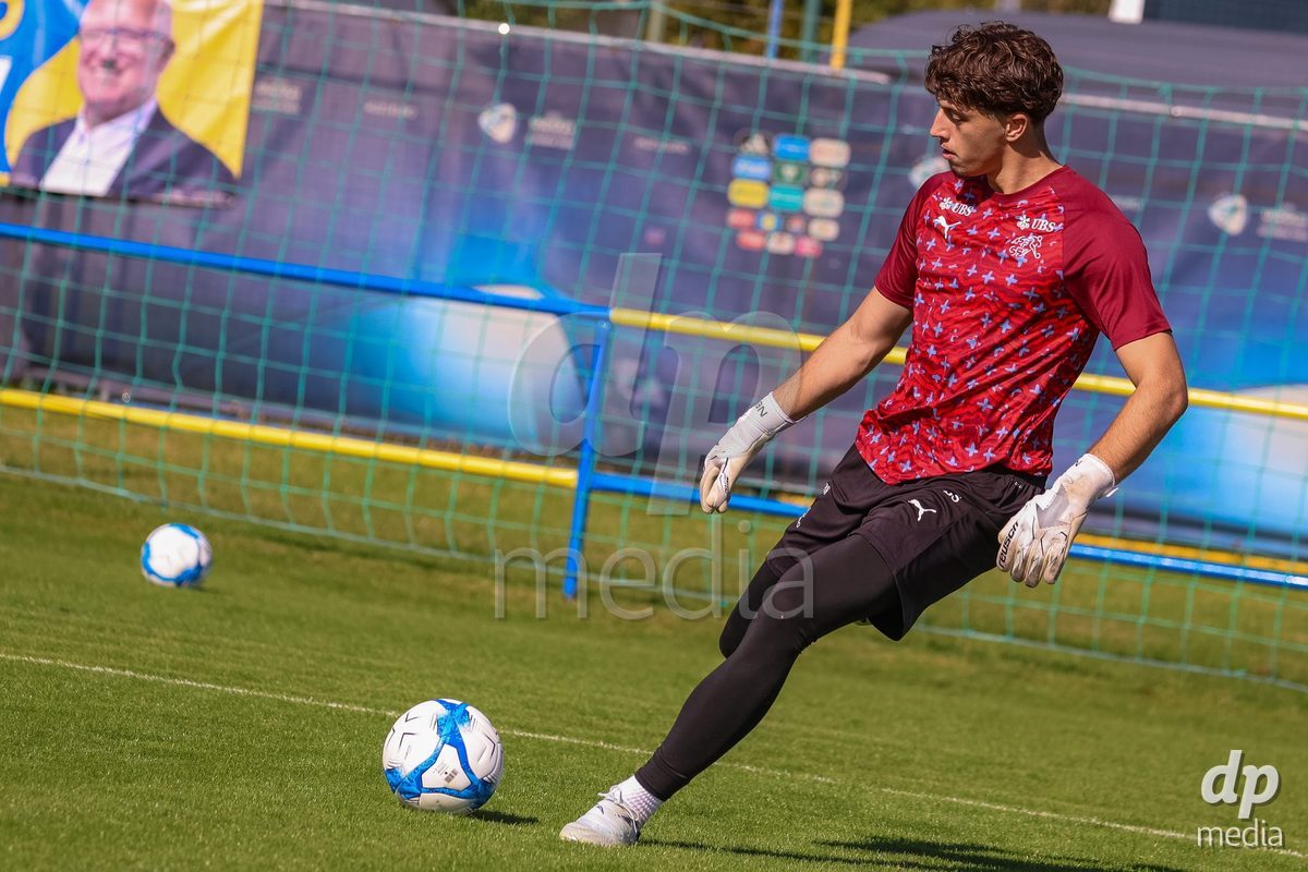DUNAJSKA LUZNA, SLOVAKIA - SEPTEMBER 25: Swiss goalkeeper warm-up the International Friendly football match between Switzerland U19 and Poland U19 on September 25, 2026 in Dunajska Luzna, Slovakia.