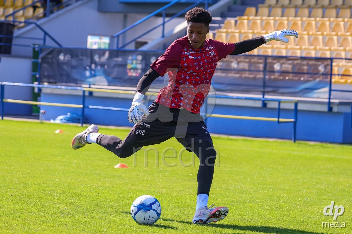 DUNAJSKA LUZNA, SLOVAKIA - SEPTEMBER 25: Swiss goalkeeper warm-up the International Friendly football match between Switzerland U19 and Poland U19 on September 25, 2026 in Dunajska Luzna, Slovakia.