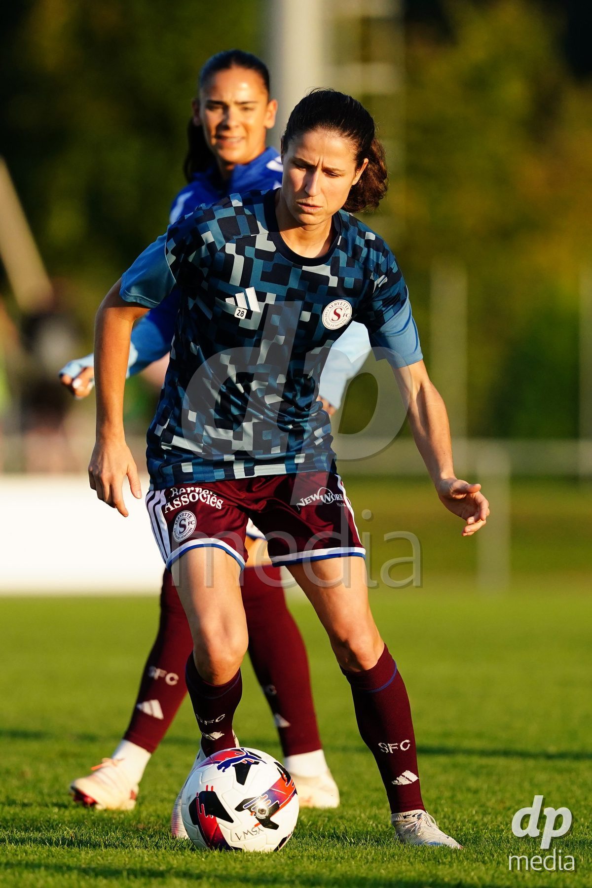 MAGADINO, SWITZERLAND - SEPTEMBER 26:  Noemie Carage of Servette FC passes the ball during warm up prio the AXA Women's Cup match between AS Gambarogno and Servette FC Chenois Feminin at Centro Sportivo on September 26, 2026 in Magadino.