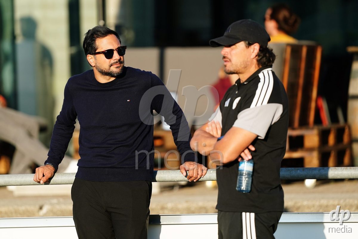 MAGADINO, SWITZERLAND - SEPTEMBER 26:  Cristian Toro head coach of the Servette FC speaks with Yoann Brigante President of the Servette FC during the AXA Women's Cup match between AS Gambarogno and Servette FC Chenois Feminin at Centro Sportivo on September 26, 2026 in Magadino.