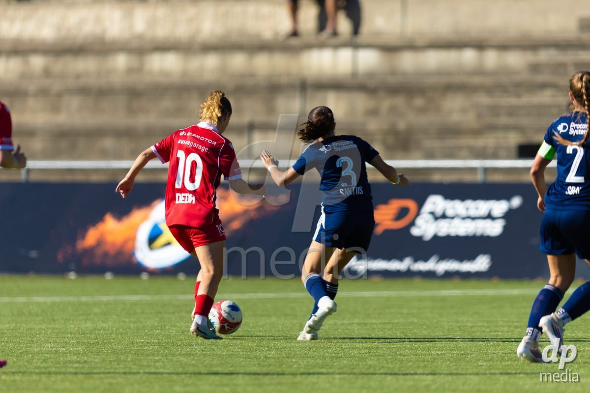 CAROUGE, SWITZERLAND - SEPTEMBER 27: 10 Donika Deda of FC Rapperswil-Jona and 3 Alicia Dos Santos of Etoile Carouge FC in action during the AXA Women's Cup match between Etoile Carouge FC and FC Rapperswil-Jona at Stade de la Fontenette on September 27, 2026 in Carouge, Switzerland.