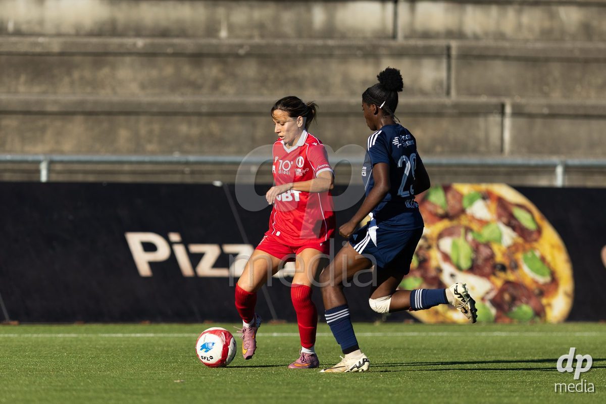 CAROUGE, SWITZERLAND - SEPTEMBER 27: 7 Evdokia Dimitrova Popadinova of FC Rapperswil-Jona in action with the ball during the AXA Women's Cup match between Etoile Carouge FC and FC Rapperswil-Jona at Stade de la Fontenette on September 27, 2026 in Carouge, Switzerland.