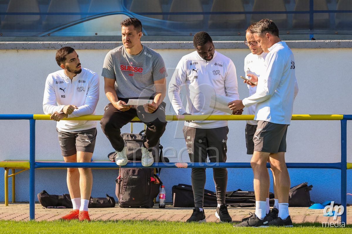 DUNAJSKA LUZNA, SLOVAKIA - SEPTEMBER 28: Switzerland crew members inspection the International Friendly football match between Kazakhstan U19 and Switzerland U19 on September 28, 2026 in Dunajska Luzna, Slovakia.