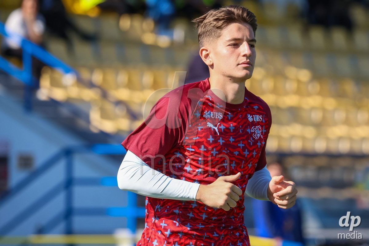 DUNAJSKA LUZNA, SLOVAKIA - SEPTEMBER 28: Switzerland team warm-up the International Friendly football match between Kazakhstan U19 and Switzerland U19 on September 28, 2026 in Dunajska Luzna, Slovakia.